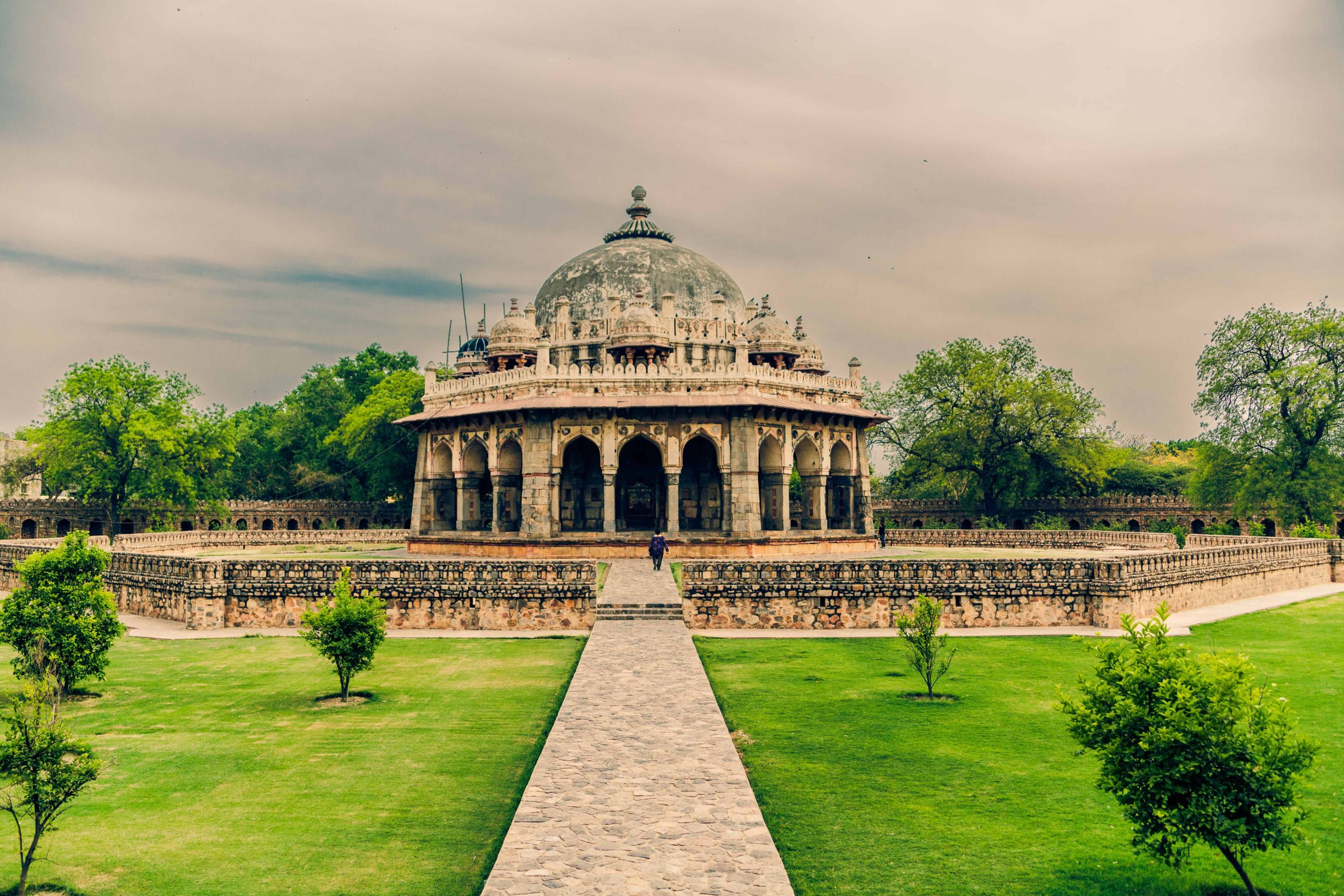 Beautiful shot of Isa Khan's Tomb in Delhi India under a cloudy sky